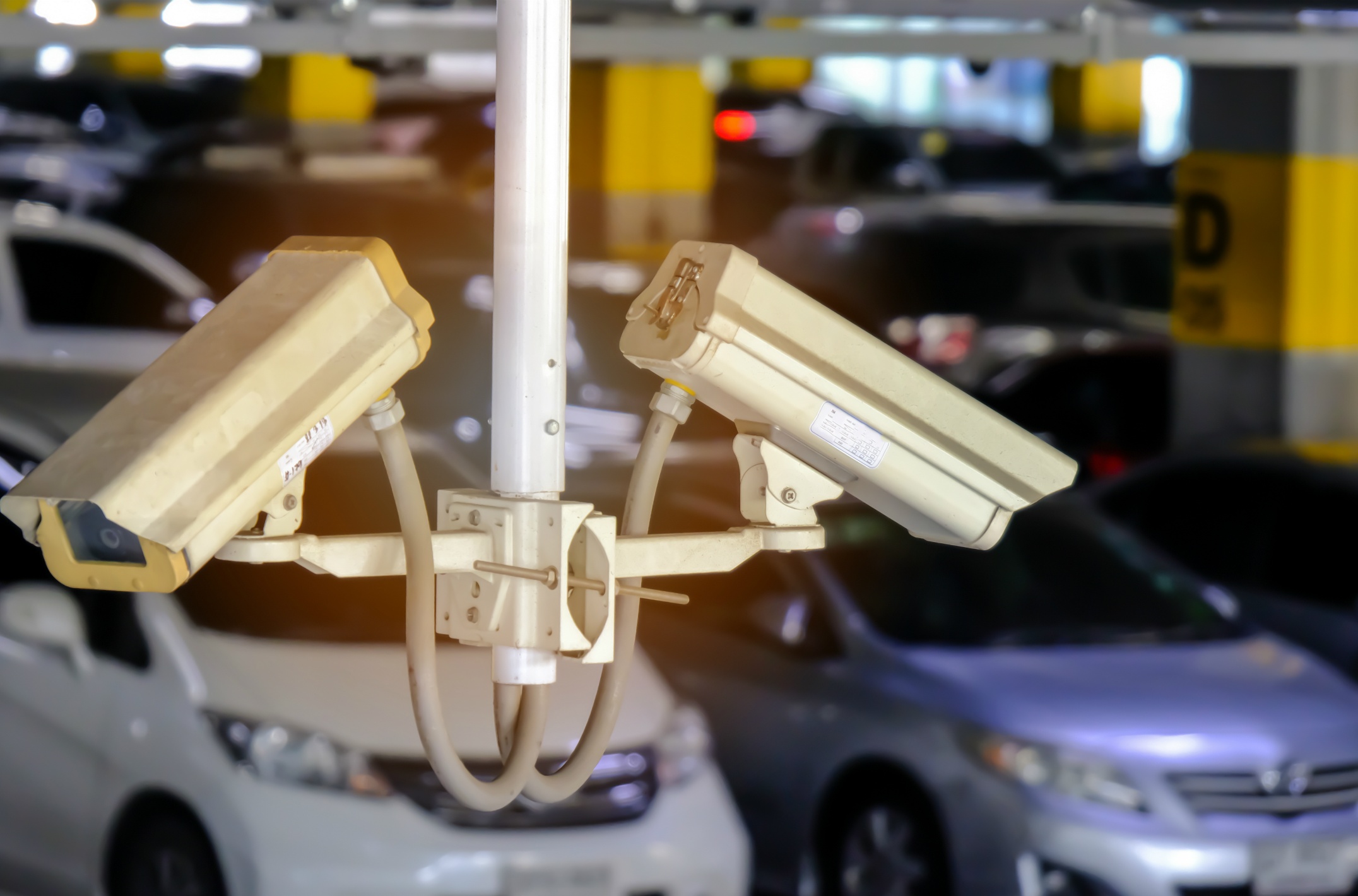 2-cctv-close-circuit-television-are-monitor-record-cars-parking-lot-shopping-mall