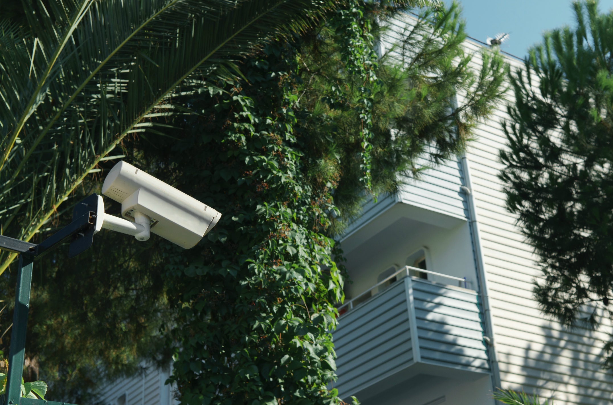 outdoor-cctv-camera-sunny-day-background-house-with-balconies